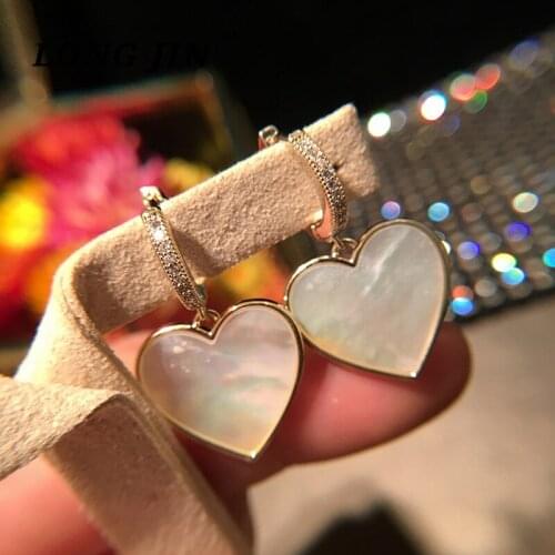 Korean version of heart-shaped mother-of-pearl earrings short white elegant pendant senior sense earrings female simple jewelry
