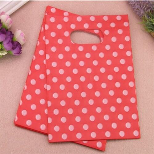 2017 New Style Wholesale 100pcs/lot 15*20cm Fashion Orange Gift Packaging Bags With Small White Dot Plastic Present Gift Bags