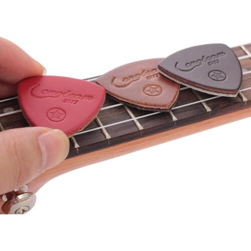 Dragonpad 3pcs Guitar Picks Pickup Leather Guitar Picks Artificial Leather Triangle Picks for Ukulele Guitar Banjor Random Color