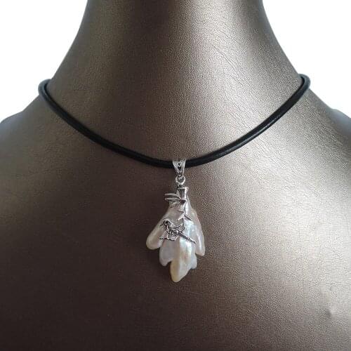 100% nature freshwater pearl pendant necklace ,REAL LEATHER chain-30-40 mm baroque pearl pendant ,IN GOLD AND SILVER ,BIRD METAL