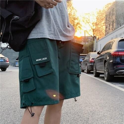 Summer new men pants fashion loose overalls trend hip-hop wild casual pants handsome pocket mens five-point pants tide