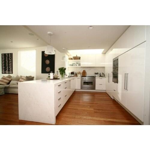 Tall white kitchen cabinet up to ceiling