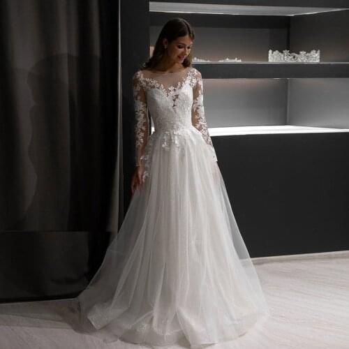Amazing A line Long Sleeve Sequins Tulle Wedding Dress Illusion Back With Button Back Bridal Gowns
