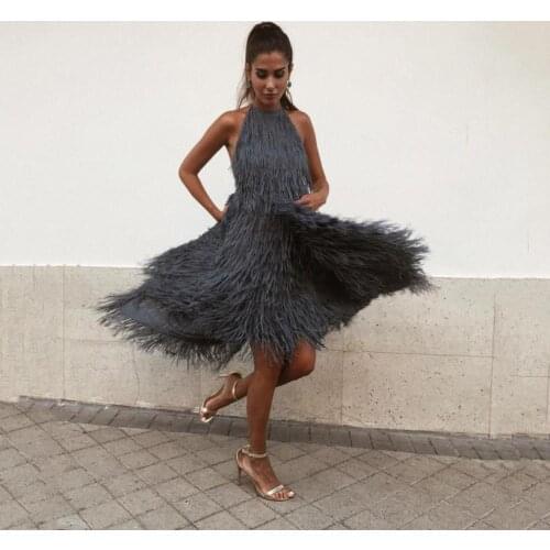 BKLD New 2019 Sexy Backless Dress Women Sleeveless Halter Summer Dress Tassel Irregular Clubwear Party Casual Mid-Calf Dress