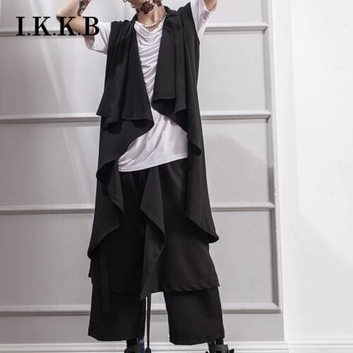 The New Korean version of the summer long sleeveless waistcoat undershirt loose fashion fashion youth thin spinning Cardigan fas