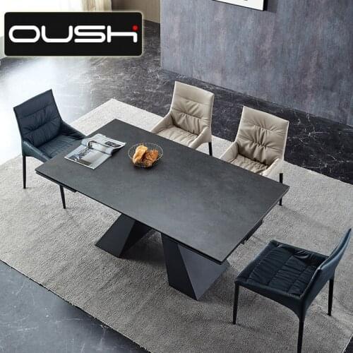 Italian rock plate dining table is retractable, simple and modern designers rectangular large and small family light luxury