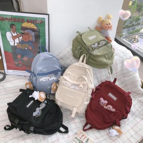 Fashion Womens Backpack Solid Color Nylon Waterproof School Bag For Girls Cute Pendant Large Capacity Bookpacks