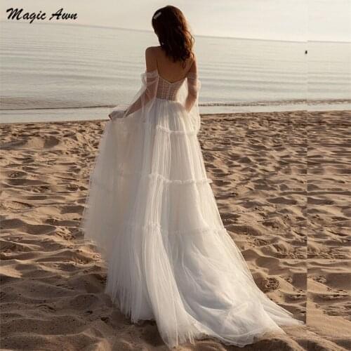 Magic Awn Off The Shoulder Beach Wedding Dresses Long Sleeves Illusion Pearls Beaded Boho Mariage Gowns Side Split Robes Mariee