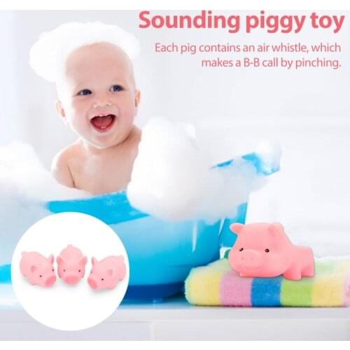 Baby playing in water toys beach bathing piggy toy vinyl doll