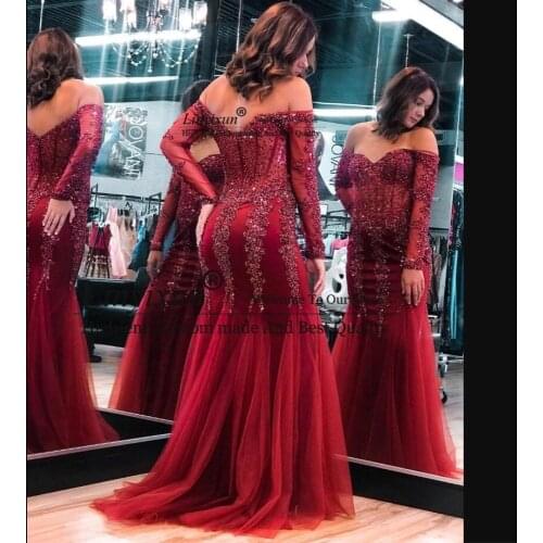New Arrived Off The Shoulder Mermaid Prom Dresses Long Sleeves Sexy Backless Lace Appliques Sequins Beaded Evening Party Gowns