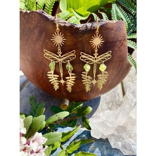 The gold plated Raw Peridot Nature Fairy Earrings. Celestial Witchy Metaphysical Jewelry