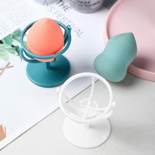 Sponge egg bracket rotatable wall-mounted cosmetic egg storage rack