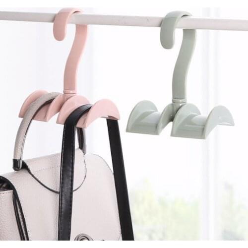 Creative multifunctional rotatable wardrobe bag hanger plastic double hook scarf coat rack tie storage rack