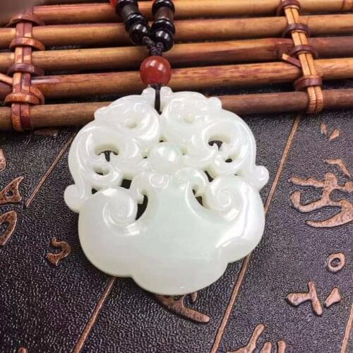 Fine and Tian Yu Shuanglong Xian Bao peace wishful pendant