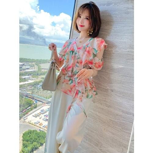 Niche off-the-shoulder ruffled printed shirt female romantic summer new products