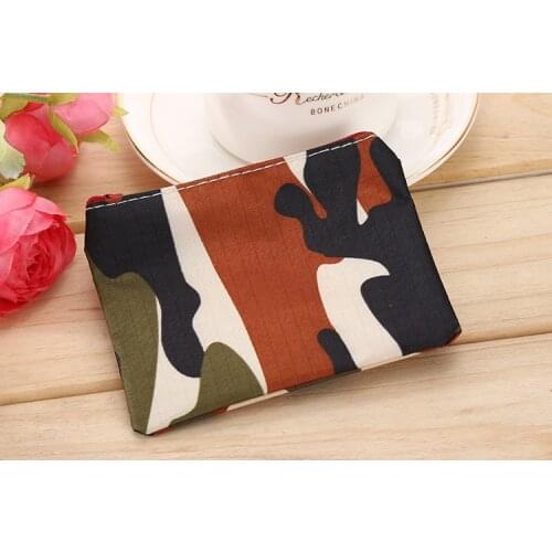 Polyester ladies coin purse keychain snack bag USB cable earphone bag mini cute oval zipper student coin purse makeup storage