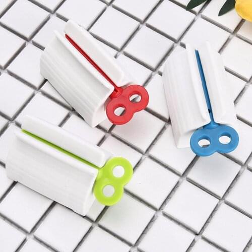 1 Pc Creative Rolling Squeezer Toothpaste Dispenser Tube Partner Sucker Hanging Holder Distributeur Dentifrice #274474