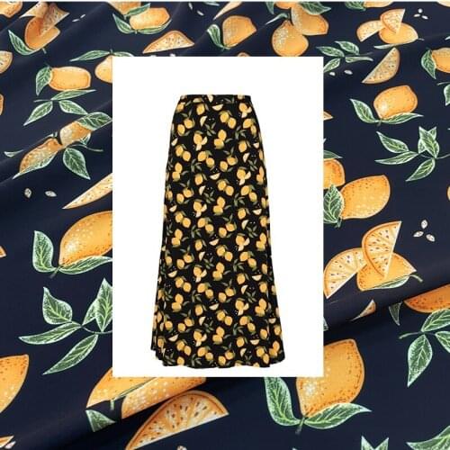 Summer brand designer fabric European niche brand lemon fruit pattern black bottom printing half skirt fashion fabric