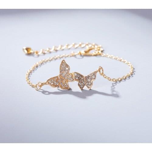 F 2 Bracelets With Charms