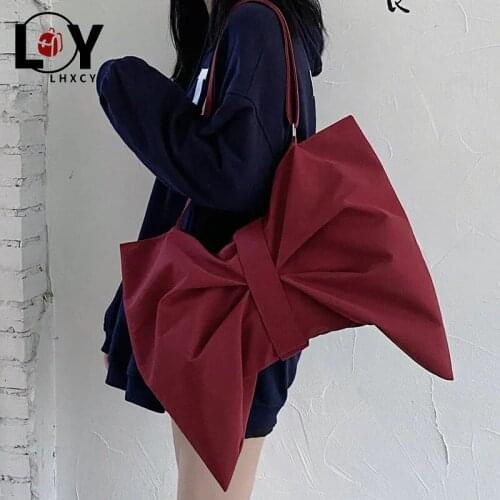 LHXCY Large Capacity Bowknot Canvas Bags Korean Version Japanese Student Small Solid Color Shoulder Bags 2021 New Messenger Bags