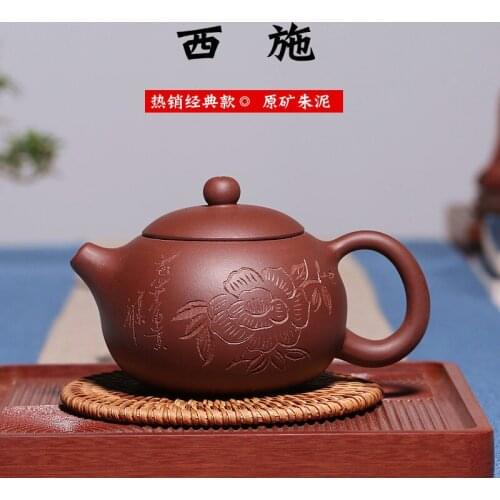 Yixing recommended all hand undressed ore shih purple clay pot carved painting peony tea shop a commission basis