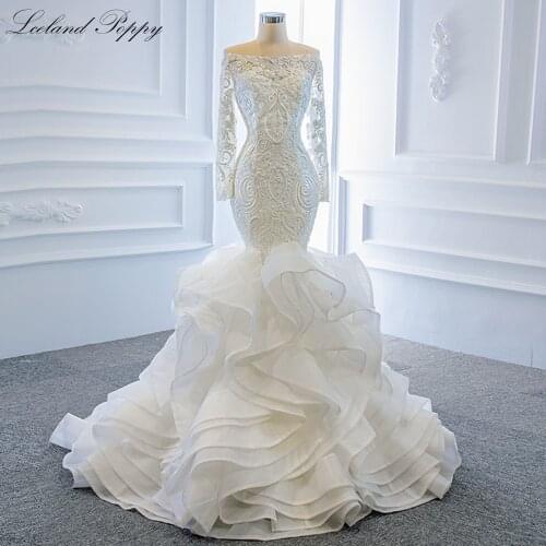 Lceland Poppy Boat Neck Mermaid Wedding Dresses 2021 Long Sleeves Beaded Lace Appliques Vestido de Novia Ruffled Bridal Gowns