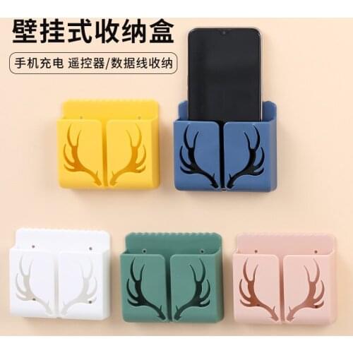 Wall-mounted remote control TV air conditioning remote control board storage box bedside mobile phone charging bracket