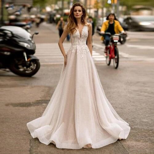 YIWUMENSA Shinny Sukienka Na Wesele Ivory Deep V Neck Bridal Gowns Sexy Backless Appliques Wedding Dresses Plus Size Robe Mariee