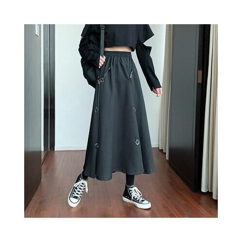 The new elastic waist shows thin lock buckle design loose with personality medium-length half-length skirt