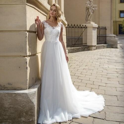 New White Tulle A-Line Wedding Dress O-Neck Sleeveless Custom Made Appliques Backless Bridal Dresses