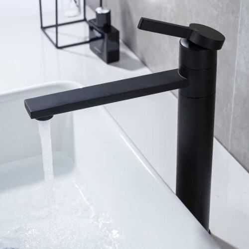 Tap from the black toilet faucet from the single basin, a hole in cold water and a hot sink sink, a mixing faucet