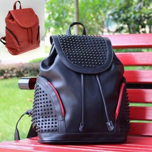Europe and America fashion leisure men and women backpacks personality rivet leather backpacks travel bags bag computer bags