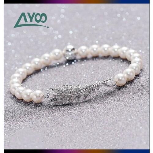 Fashion Jewelry SWA High Quality Charm Crystal Feather Pearl Magnetic Buckle Temperament Womens Pearl Bracelet Romantic Gift