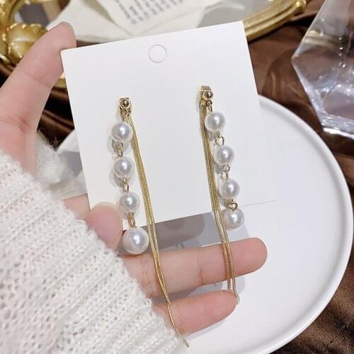Korean super fairy earrings female long face thin earrings temperament simple net red tassel pearl earrings