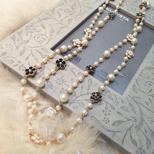 Korean jewelry winter flower sweater chain long pearl necklace pendant jewelry double female