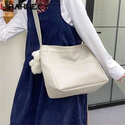 2021 New Solid Color Designer Womens Shoulder Bag Cute Pendant Design Women Bags High Quality PU Leather Ladies Messenger Bag