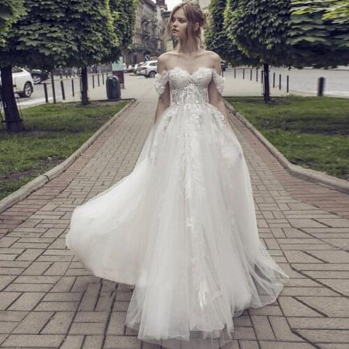 Off the Shoulder Wedding Dresses Sweetheart A-line Tulle Beach Appliques 2021 A-line Ivory Bridal Gowns Puffy Vestidos De Noiva