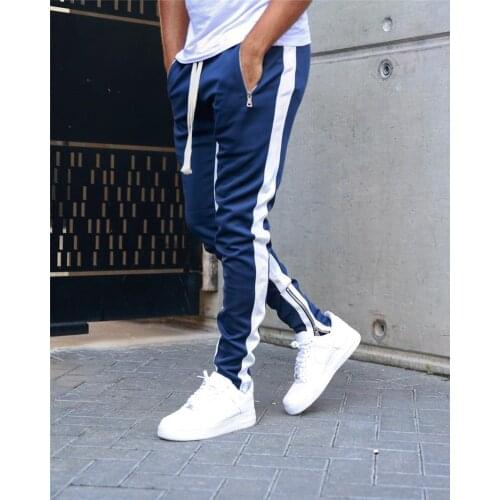 The New Spring and fall 2021 style mens stitching long pants with zipper cuffs and leisure pants for mens sports cuffs