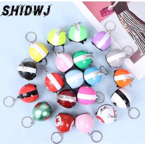 New Car Keychain Motorcycle Helmets Key Chain Women Men Cute Safety Helmet Bags Hot Key Ring Gift Jewelry Car Decoration Goods