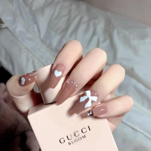 24pcs/box Fake Nails With Glue Love Heart Bow Pearl Type Long Paragraph Fashion Manicure False Nails Press On With Designs DL