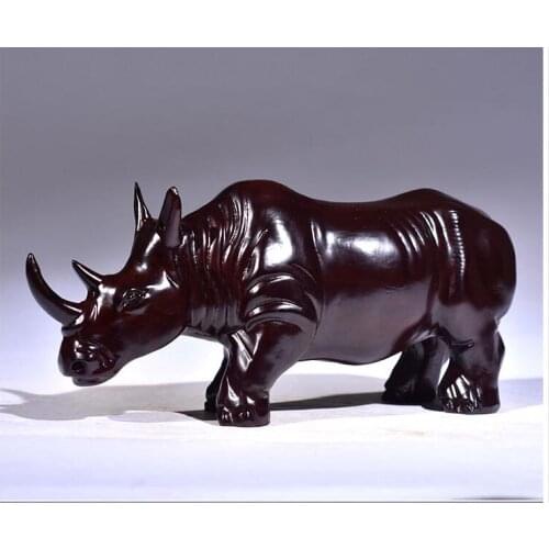 Rhinoceros ornaments carved in ebony Bovine spirit soars Rhinoceros sky solid wood Animal home decoration mahogany craft gifts