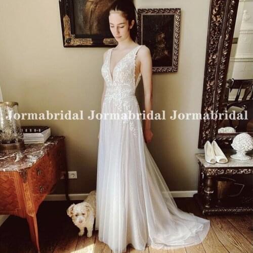 Bohemian Appliques Lace Tulle Wedding Dresses Boho V-Neck Open Back Sleeveless Customize Summer Beach Bridal Gowns suknia slubna
