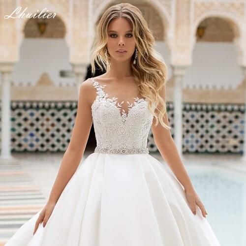 Lhuilier Elegant A-line Satin Wedding Dresses 2020 Sleeveless Floor Length Lace Appliques Backless Bridal Dress with Belt