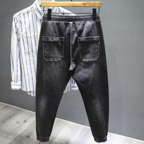 2020!Versatile fashion ripped pants slim stretch pants young white jeans man