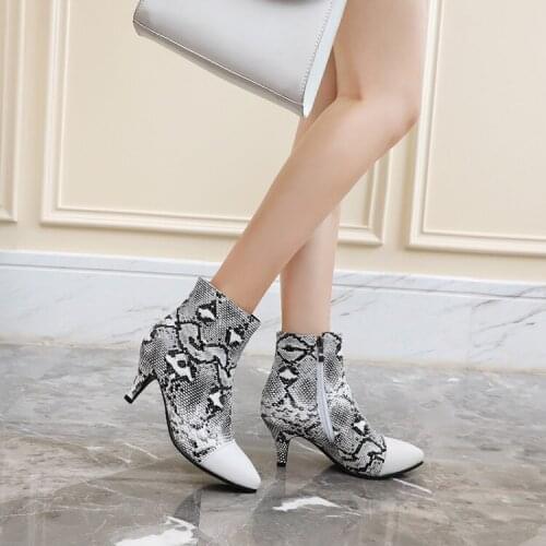 European and American street serpentine elastic slim high heel ultra-high heel autumn / winter 2018 boots large boots Short Boot