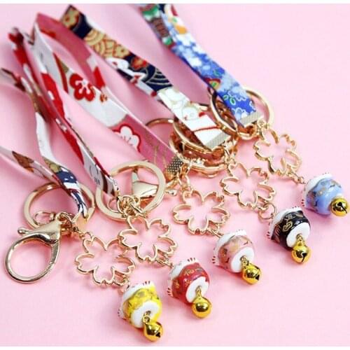 2020 Zhaocai cat key clasp hand rope pendant creative personality car cute men and women key chain ring package hanging