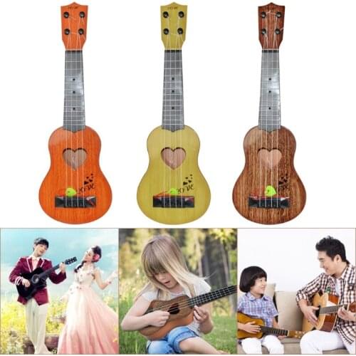 2021 New Kids Guitar Musical Toy,Soprano Ukulele for Kid, Beginners Guitar Ukelele