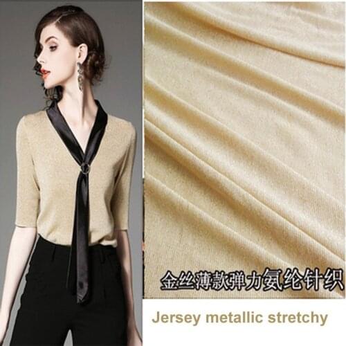 Metallic knitted bright shimmer poly beige fabric shirt sweater sparkling thin spring fabric