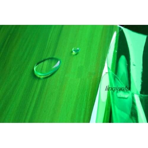 Colorful green color liquid laser film fabric fashion waterproof leather fabric High-end illusion clothing fabric