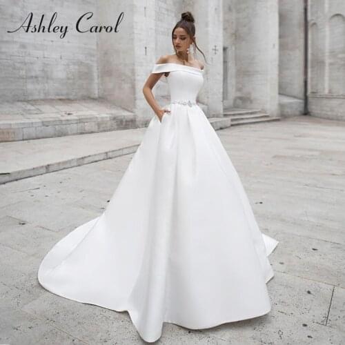 Ashley Carol A-Line Wedding Dress 2021 Elegant Satin Boat Neck Beading Sashes Lace Up Princess Bride Dresses Vestido De Noiva